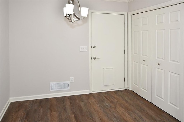 8310 Jensen Trl, Gainesville, GA 30506 - unfurnished dining area featuring baseboards and dark wood-style flooring