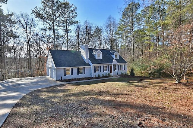8310 Jensen Trl, Gainesville, GA 30506 - cape cod house featuring a chimney, concrete driveway, and an attached garage