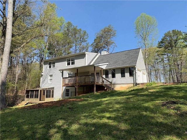 8310 Jensen Trl, Gainesville, GA 30506 - back of property featuring a sunroom, a lawn, a chimney, and roof with shingles