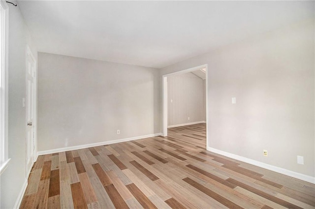 unfurnished room featuring light wood-type flooring