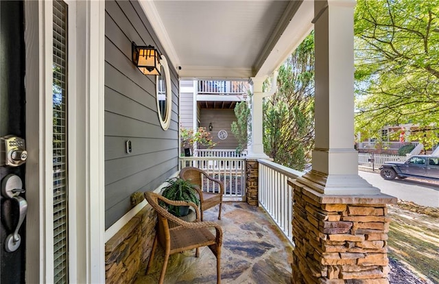 view of patio featuring a porch