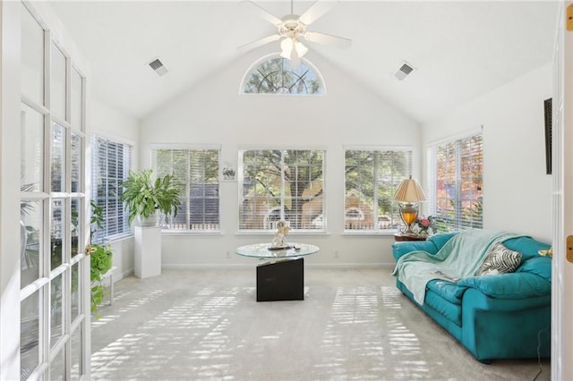 sunroom with vaulted ceiling and ceiling fan