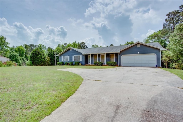 single story home with concrete driveway, covered porch, a front yard, and a garage