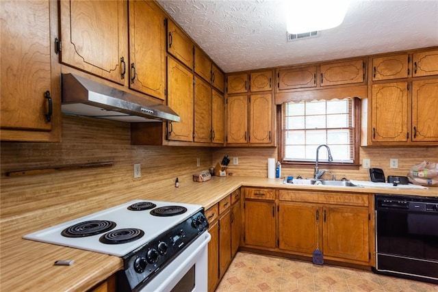 kitchen with visible vents, white range with electric cooktop, under cabinet range hood, a sink, and dishwasher