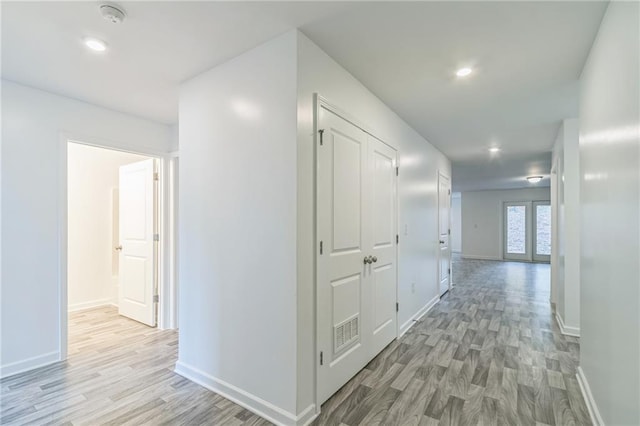 hall featuring light wood-type flooring