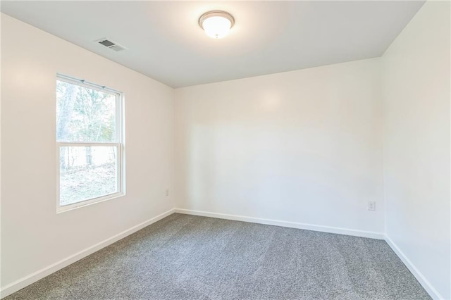 view of carpeted spare room