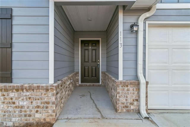 property entrance featuring a garage