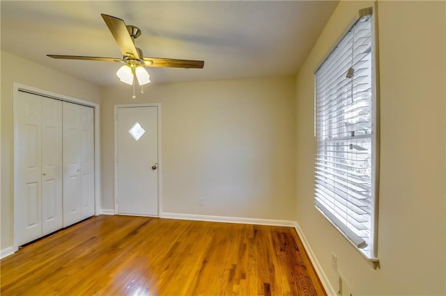 entrance foyer featuring hardwood / wood-style flooring and ceiling fan