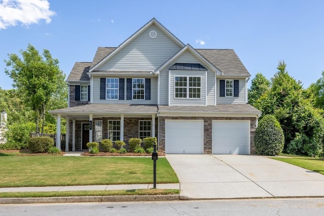 895 Roxfield Ct, Buford, GA 30518 - view of front of property featuring concrete driveway, a garage, a front lawn, and stone siding