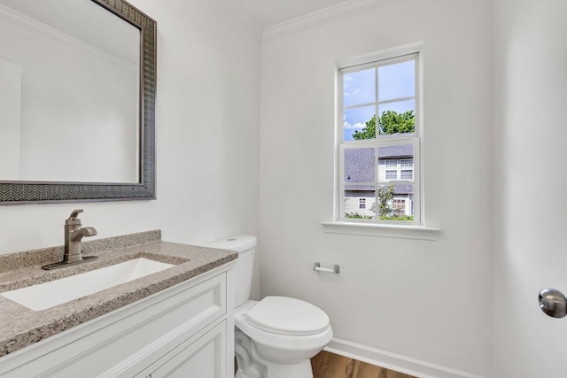 895 Roxfield Ct, Buford, GA 30518 - half bathroom with toilet, crown molding, vanity, wood finished floors, and baseboards