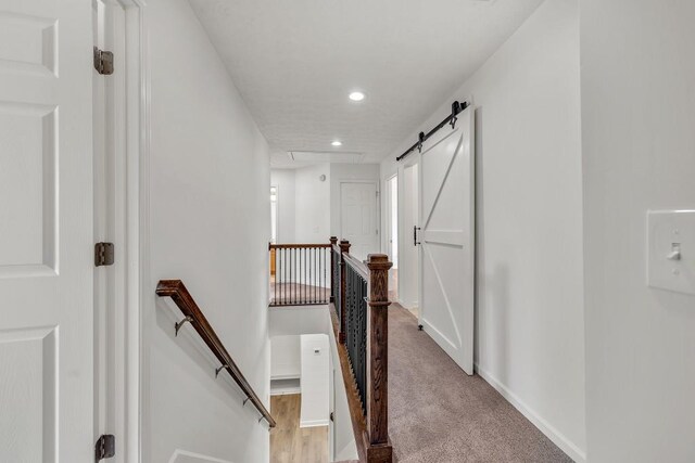 895 Roxfield Ct, Buford, GA 30518 - corridor featuring an upstairs landing, recessed lighting, baseboards, and light colored carpet