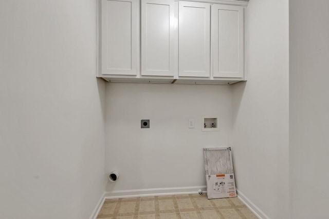 895 Roxfield Ct, Buford, GA 30518 - laundry room featuring cabinet space, baseboards, electric dryer hookup, hookup for a washing machine, and light floors