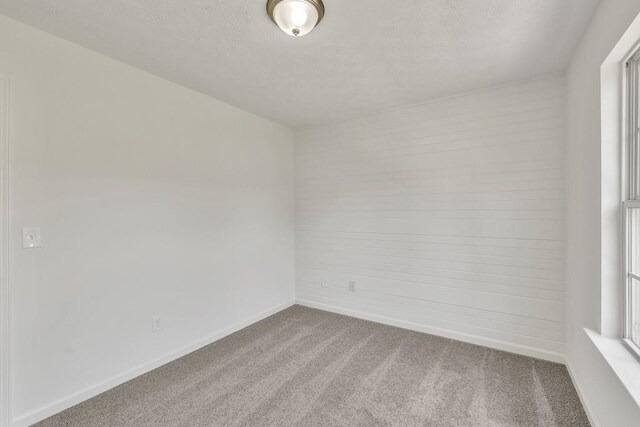 895 Roxfield Ct, Buford, GA 30518 - empty room with carpet and baseboards