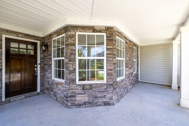 895 Roxfield Ct, Buford, GA 30518 - property entrance featuring stone siding and covered porch