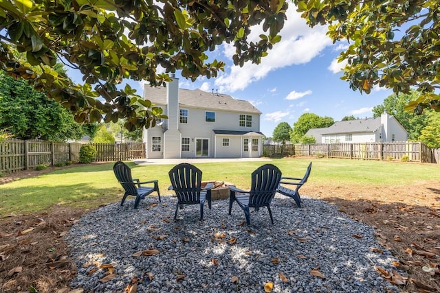 895 Roxfield Ct, Buford, GA 30518 - rear view of house with an outdoor fire pit, french doors, a patio area, and a chimney