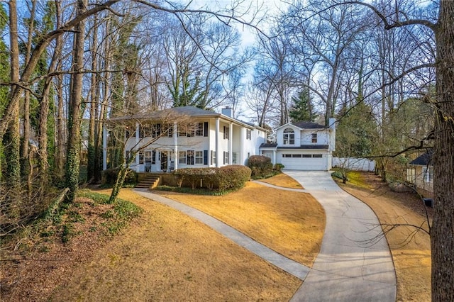 bi-level home with a garage and a porch