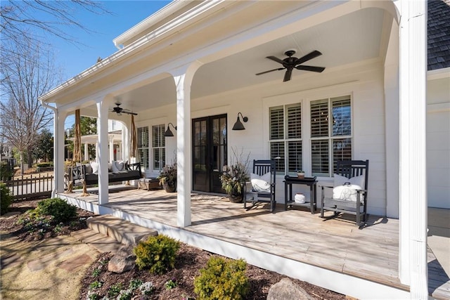 view of patio / terrace featuring ceiling fan and fence