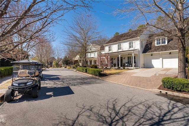 view of street with sidewalks and curbs