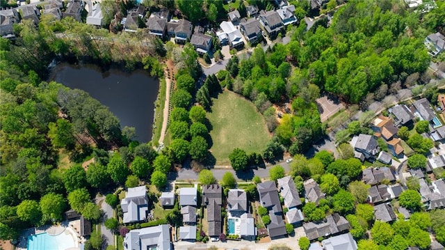 aerial view with a residential view and a water view