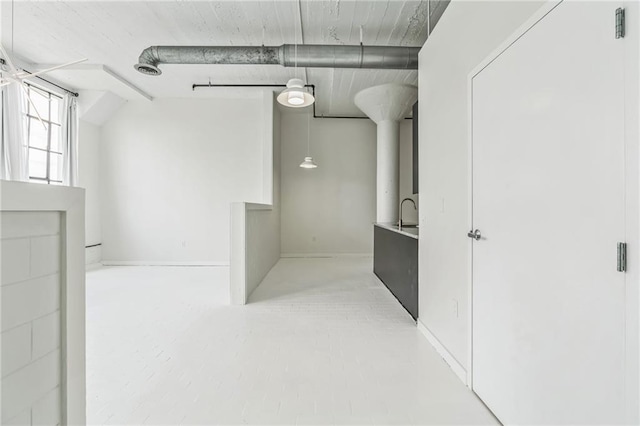 881 Memorial Dr SE Unit 307, Atlanta, GA 30316 - basement with baseboards