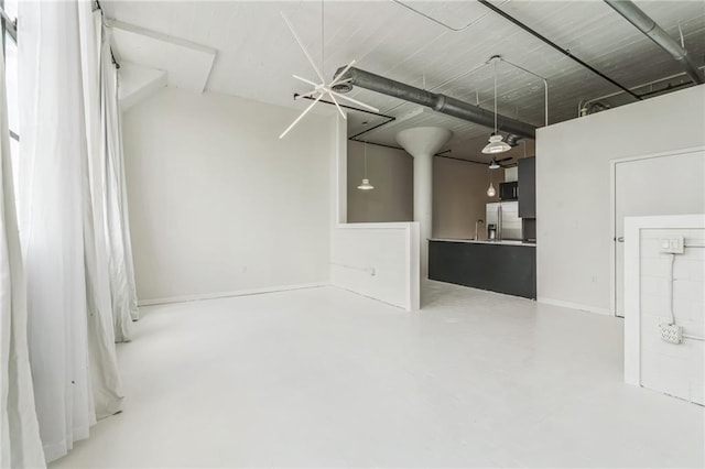 881 Memorial Dr SE Unit 307, Atlanta, GA 30316 - garage with stainless steel fridge and a sink