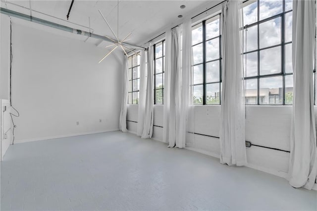 881 Memorial Dr SE Unit 307, Atlanta, GA 30316 - unfurnished room with healthy amount of natural light and baseboards