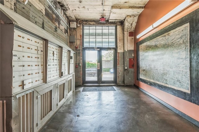 881 Memorial Dr SE Unit 307, Atlanta, GA 30316 - interior space with concrete flooring and mail area