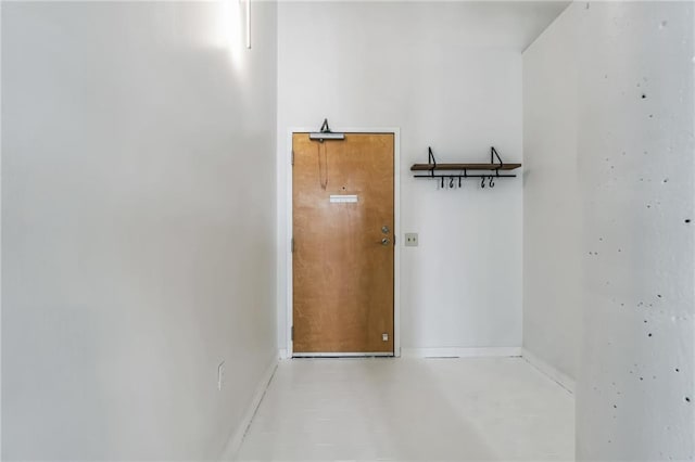 881 Memorial Dr SE Unit 307, Atlanta, GA 30316 - corridor featuring baseboards and concrete floors