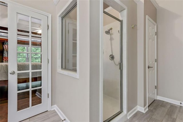 2073 Woodside Park Dr, Woodstock, GA 30188 - full bath featuring a shower stall and wood finished floors