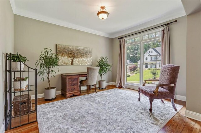 2073 Woodside Park Dr, Woodstock, GA 30188 - sitting room featuring crown molding and wood finished floors
