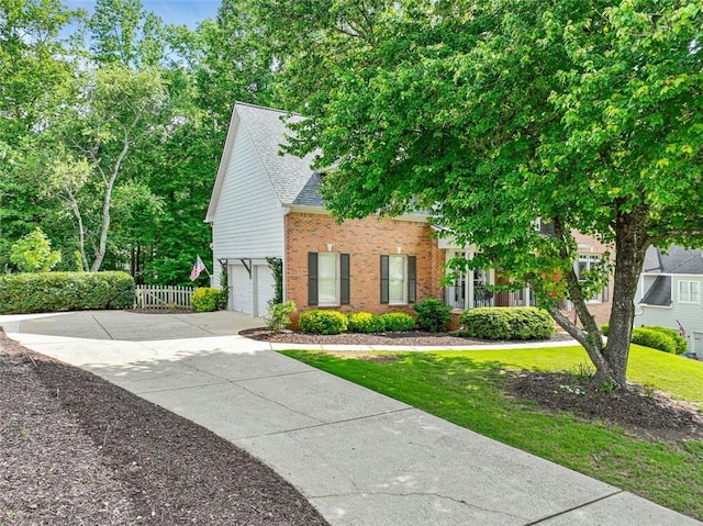 2073 Woodside Park Dr, Woodstock, GA 30188 - view of front of house with brick siding, driveway, a garage, and a shingled roof