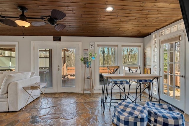 unfurnished sunroom with french doors and wooden ceiling