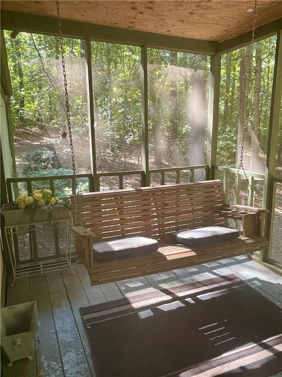 unfurnished sunroom featuring a healthy amount of sunlight