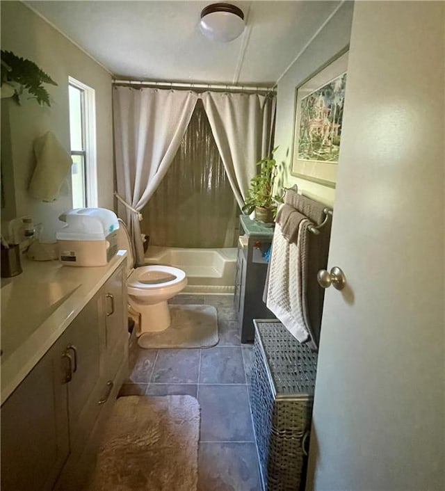 full bathroom with vanity, tile patterned flooring, toilet, and shower / bathtub combination with curtain