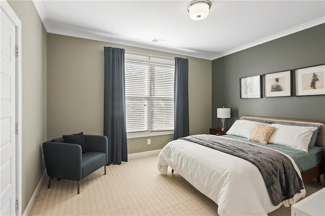 bedroom with ornamental molding and light colored carpet