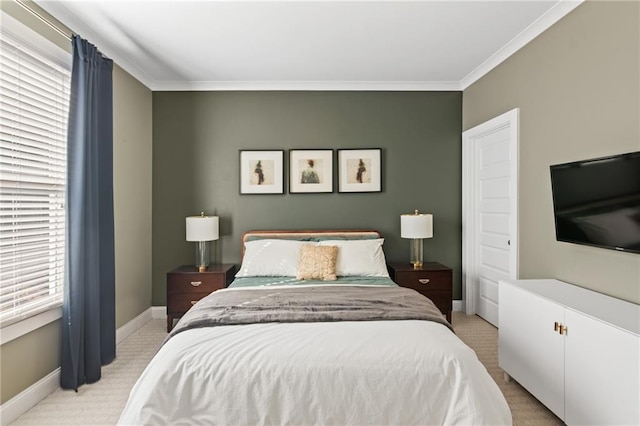 bedroom featuring crown molding, multiple windows, and light colored carpet