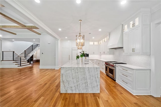 115 Baxley Ln, Alpharetta, GA 30004 - kitchen with white cabinetry, recessed lighting, a chandelier, custom exhaust hood, and range with two ovens