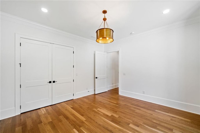 115 Baxley Ln, Alpharetta, GA 30004 - interior space with crown molding, a closet, recessed lighting, light wood finished floors, and baseboards