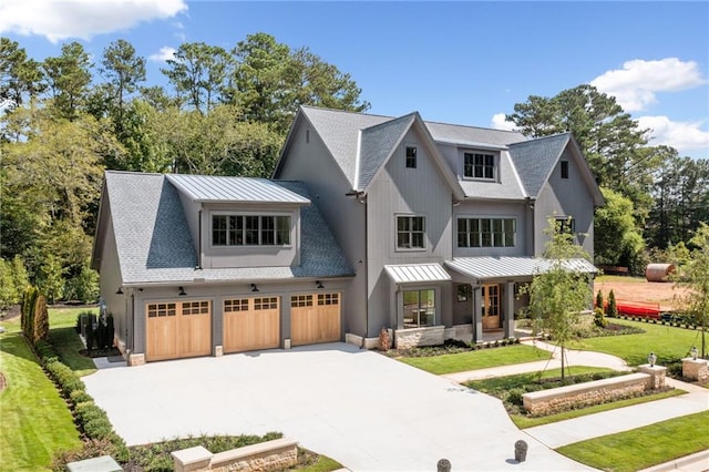 115 Baxley Ln, Alpharetta, GA 30004 - modern farmhouse style home featuring a garage, a front yard, a shingled roof, and concrete driveway