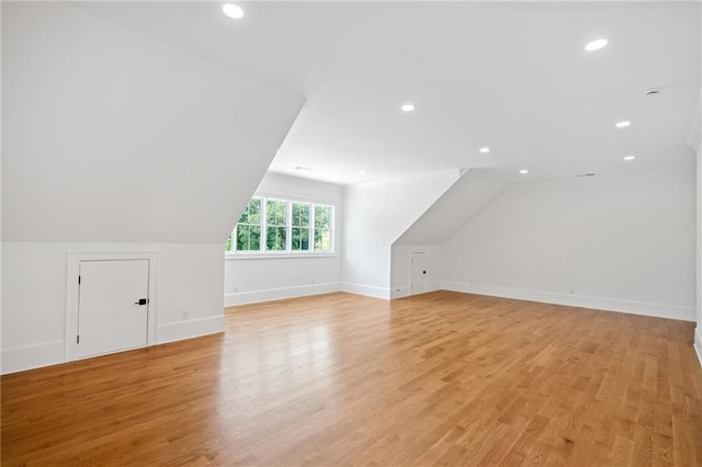 115 Baxley Ln, Alpharetta, GA 30004 - bonus room featuring light wood finished floors, baseboards, lofted ceiling, and recessed lighting