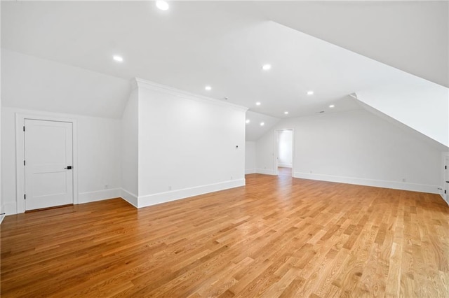 115 Baxley Ln, Alpharetta, GA 30004 - additional living space featuring light wood-style floors, baseboards, lofted ceiling, and recessed lighting