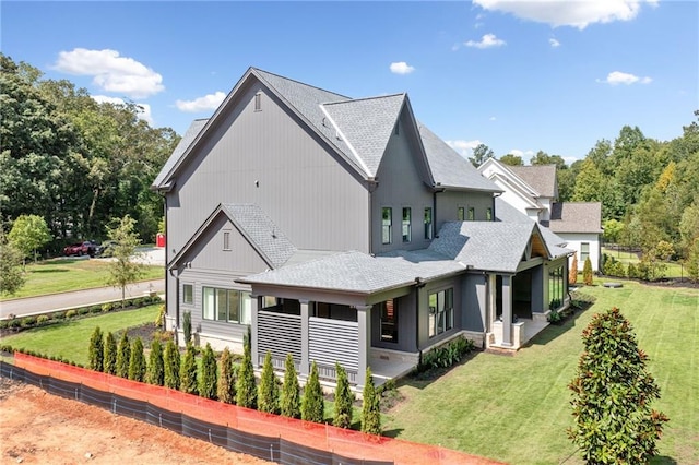 115 Baxley Ln, Alpharetta, GA 30004 - rear view of property featuring a yard
