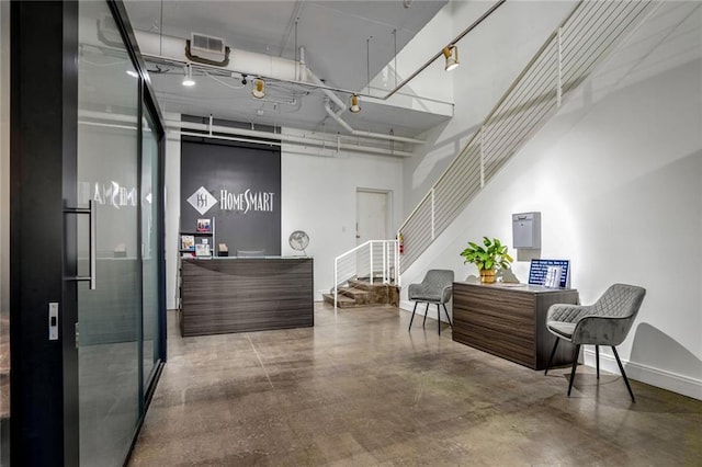 welcome area with stairway and visible vents