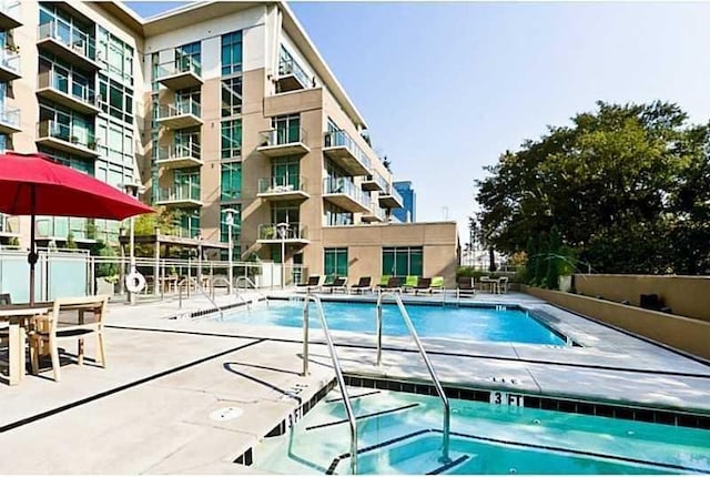 community pool featuring a patio