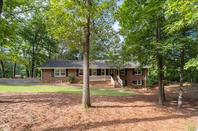 71 Seminole Trl SW, Cartersville, GA 30120 - single story home featuring covered porch, brick siding, and a front yard