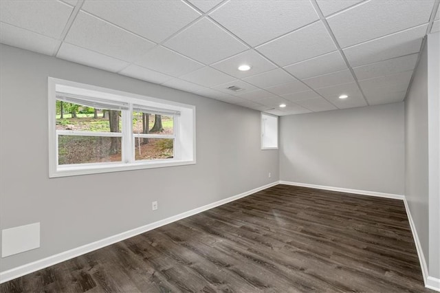 71 Seminole Trl SW, Cartersville, GA 30120 - unfurnished room featuring dark wood-style floors, baseboards, recessed lighting, and a paneled ceiling