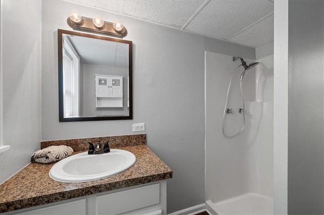 71 Seminole Trl SW, Cartersville, GA 30120 - full bathroom featuring a shower, a paneled ceiling, and vanity