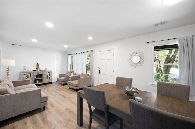 dining room with light hardwood / wood-style flooring