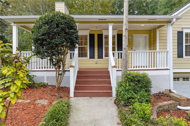 178 Seals Dr, Dallas, GA 30157 - doorway to property with a porch and a chimney