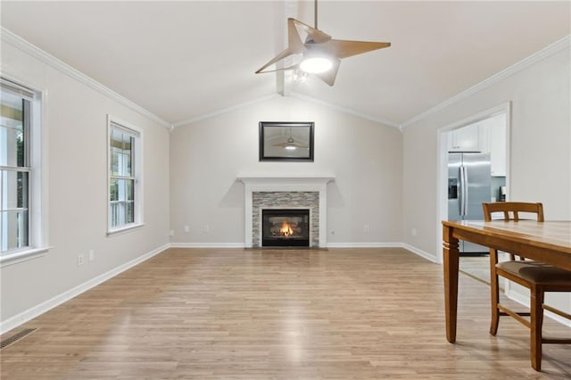 178 Seals Dr, Dallas, GA 30157 - unfurnished living room with baseboards, ornamental molding, a ceiling fan, visible vents, and light wood finished floors